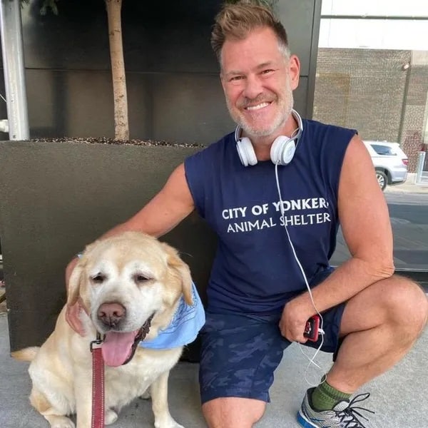 Barlett with a friend's yellow lab