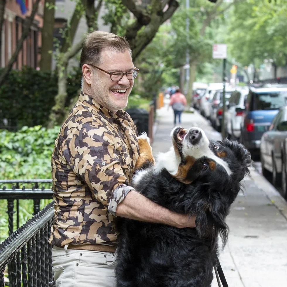 Bartlett hugging is Bernese Mountain Dog, named Hug, on West 24th Street in Manhattan...both looking very happy