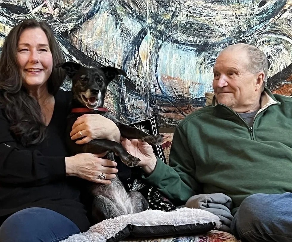 Image of Tracy, Ruby, and Lucian relaxing in their East Hampton living room. -Love, Dog-